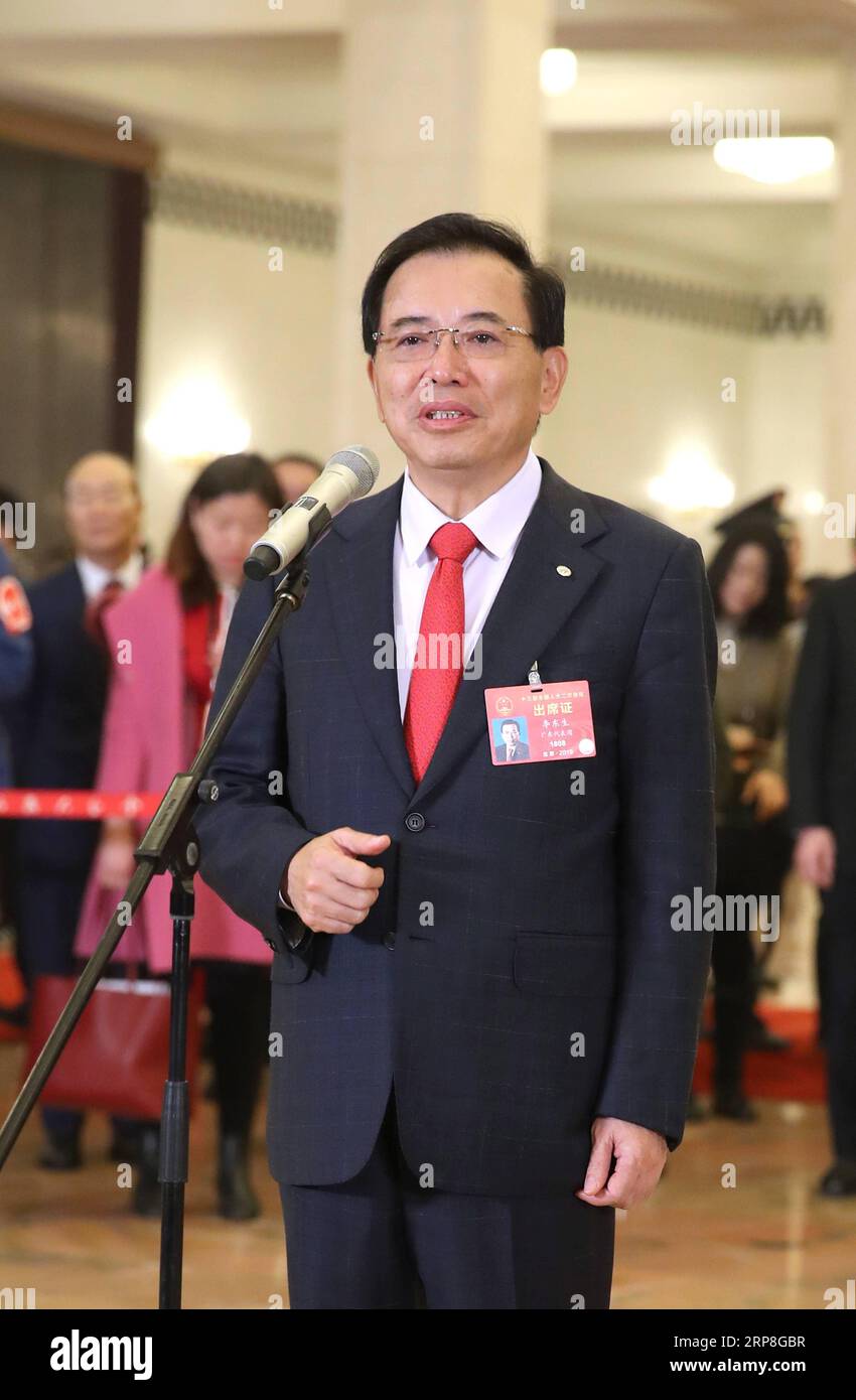 (190305) -- BEIJING, March 5, 2019 -- Li Dongsheng, a deputy to the 13th National People s Congress (NPC), receives an interview before the opening meeting of the second session of the 13th NPC in Beijing, capital of China, March 5, 2019. ) (TWO SESSIONS)CHINA-BEIJING-NPC-DEPUTIES-INTERVIEW (CN) YinxGang PUBLICATIONxNOTxINxCHN Stock Photo