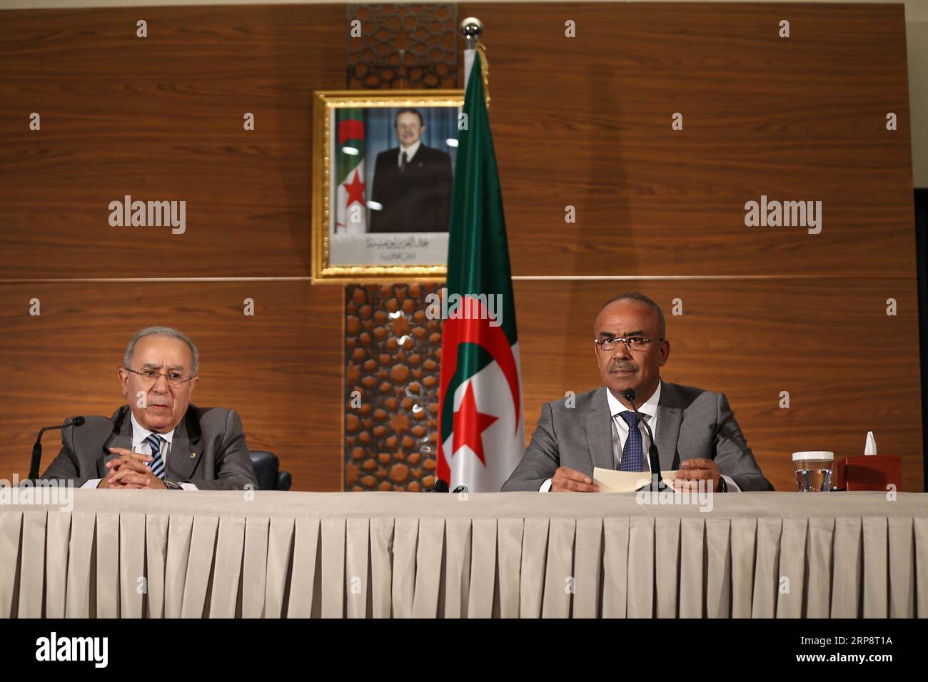 Algerien, Pressekonferenz von Ministerpräsident Noureddine Bedoui (190314) -- ALGIERS, March 14, 2019 () -- Algerian newly appointed Prime Minister Noureddine Bedoui (R) and Foreign Minister Ramtane Lamamra attend a joint press conference in Algiers, capital of Algeria, on March 14, 2019. Noureddine Bedoui on Thursday pledged that the cabinet he is due to form will be tasked with the mission of guaranteeing smooth transition of power. () ALGERIA-ALGIERS-PM-FM-PRESS CONFERENCE Xinhua PUBLICATIONxNOTxINxCHN Stock Photo