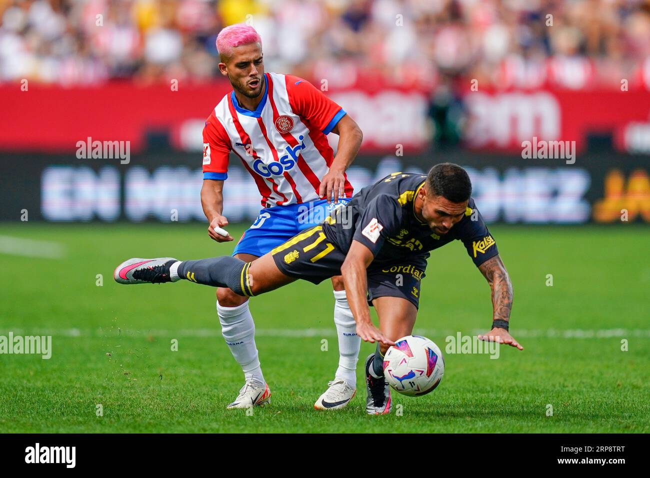 Girona, Spain. 03rd Sep, 2023. Yan Couto of Girona FC and Benito Ramirez of UD Las Palmas during the La Liga EA Sports match between Girona FC and UD Las Palmas played at Montilivi Stadium on September 3, 2023 in Girona, Spain. (Photo by Sergio Ruiz/PRESSINPHOTO) Credit: PRESSINPHOTO SPORTS AGENCY/Alamy Live News Stock Photo