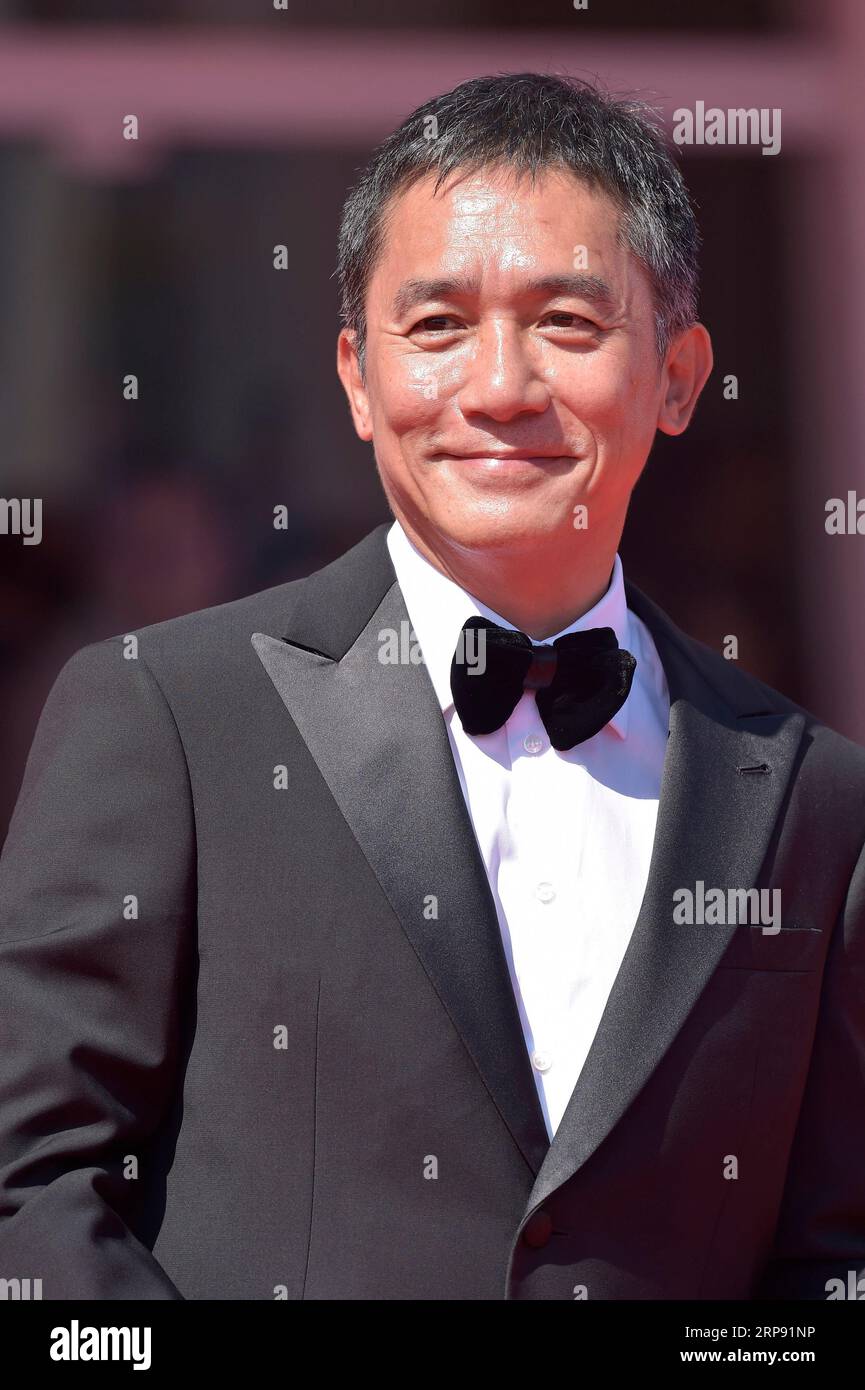 Venice, Italy. 02nd Sep, 2023. Tony Leung Chiu-wai attends a red carpet for the Golden Lion For Lifetime Achievement Award & 'The Lion's Share: A History Of The Mostra' at the 80th Venice International Film Festival on Saturday, September 2, 2023 in Venice, Italy. Photo by Rocco Spaziani/UPI Credit: UPI/Alamy Live News Stock Photo