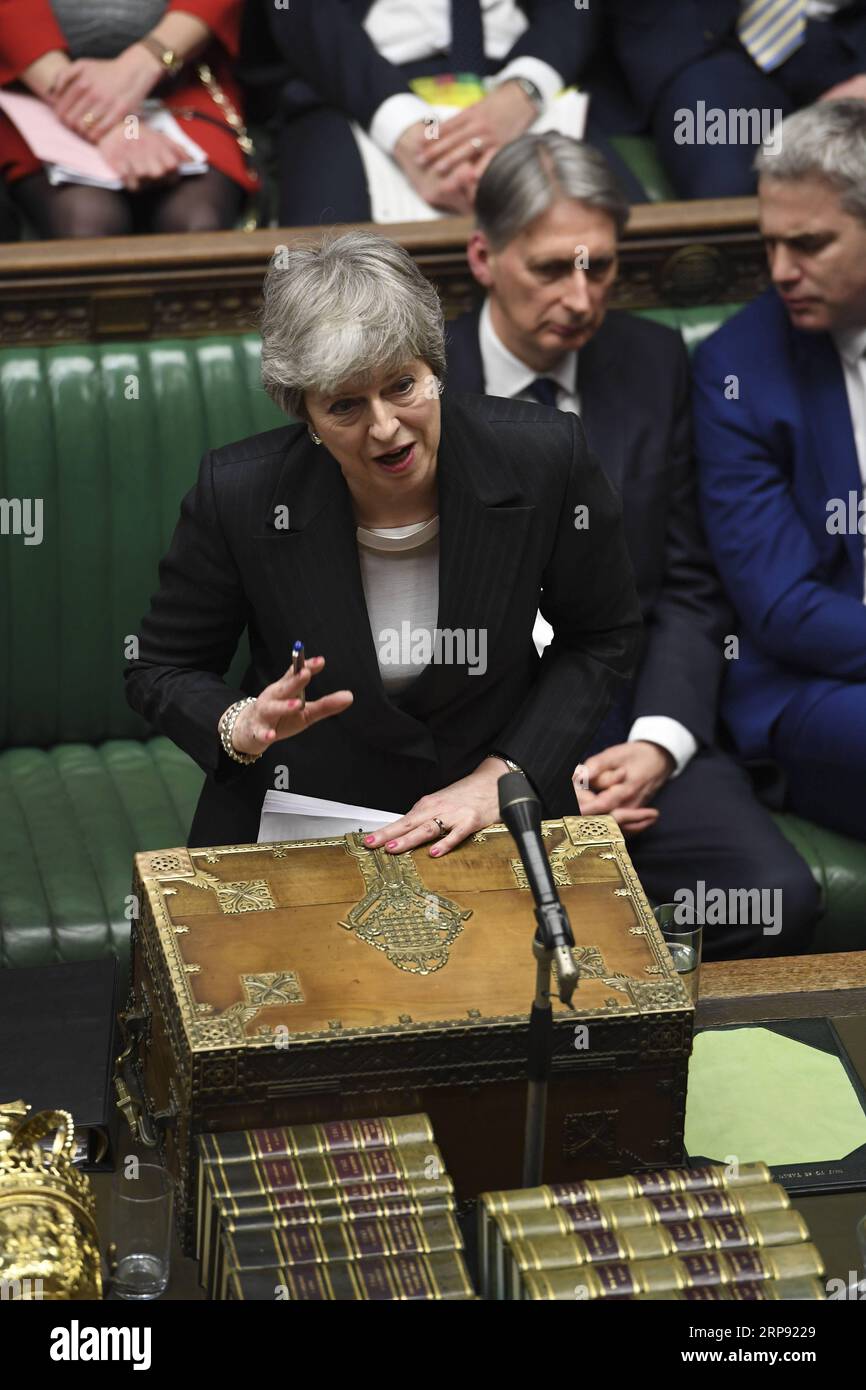 (190320) -- LONDON, March 20, 2019 -- British Prime Minister Theresa May (Front) speaks during the Prime Minister s Question Time in the House of Commons in London, Britain, on March 20, 2019. Theresa May confirmed Wednesday she has written to the European Union seeking to delay Britain s departure from the bloc until June 30. ) HOC MANDATORY CREDIT: BRITAIN-LONDON-PM-BREXIT-DELAY UKxParliament/JessicaxTaylor PUBLICATIONxNOTxINxCHN Stock Photo