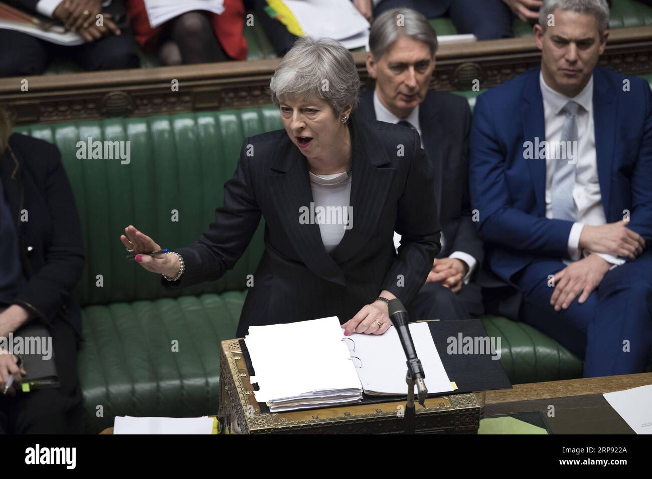 (190320) -- LONDON, March 20, 2019 -- British Prime Minister Theresa May (Front) speaks during the Prime Minister s Question Time in the House of Commons in London, Britain, on March 20, 2019. Theresa May confirmed Wednesday she has written to the European Union seeking to delay Britain s departure from the bloc until June 30. ) HOC MANDATORY CREDIT: BRITAIN-LONDON-PM-BREXIT-DELAY UKxParliament/JessicaxTaylor PUBLICATIONxNOTxINxCHN Stock Photo