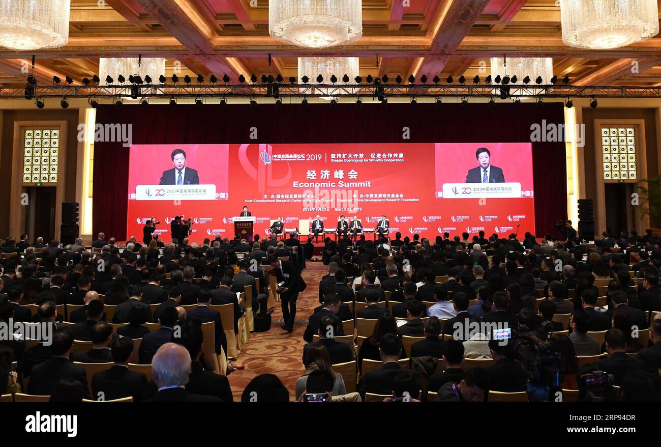 (190323) -- BEIJING, March 23, 2019 (Xinhua) -- The Economic Summit of China Development Forum 2019 is held in Beijing, capital of China, March 23, 2019. The three-day China Development Forum, which kicked off Saturday, will focus on key issues such as the supply-side structural reform, new measures of proactive fiscal policy, and the opening-up of the financial sector and financial stability. More than 50 officials from the Chinese central government s departments and over 150 overseas delegates will participate in the forum, including 96 executives from the world s leading companies and near Stock Photo