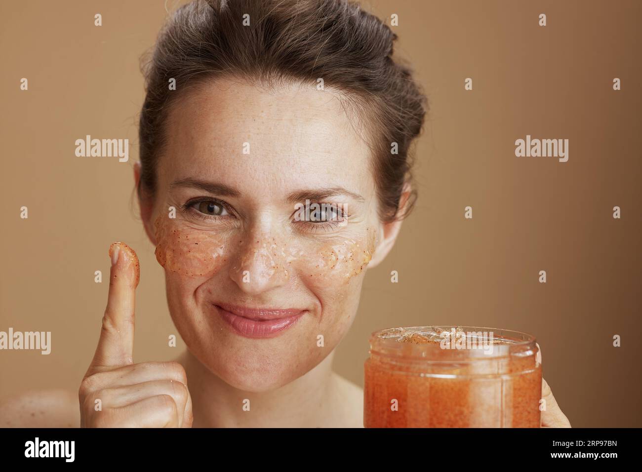 Mature woman face scrub hi-res stock photography and images - Alamy