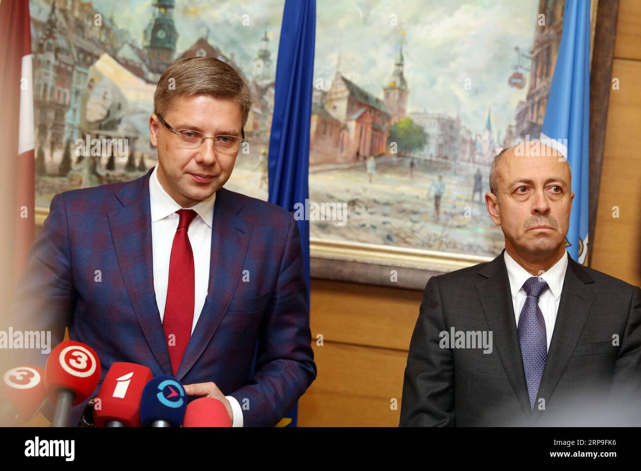 (190405) -- RIGA, April 5, 2019 (Xinhua) -- Nils Usakovs (L) reacts during a press briefing after his dismissal from the post of Riga mayor in Riga, capital of Latvia, April 5, 2019. Latvian Environmental Protection and Regional Development Minister Juris Puce sacked Riga mayor Nils Usakovs on Friday, blaming him for a failure to prevent serious illegalities in the Latvian capital s municipal transport company. The mayor lost his job for not performing his office duties as prescribed by law and for several violations, according to the minister s decree published in the official newspaper Latvi Stock Photo