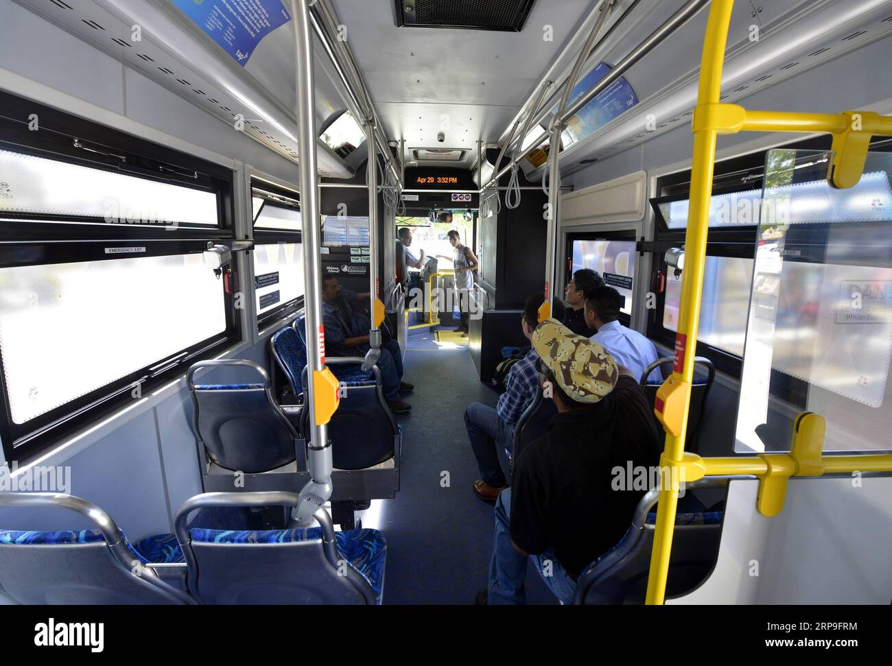 (190405) -- NEW YORK, April 5, 2019 (Xinhua) -- File photo taken on April 29, 2015 shows local residents boarding an electric bus of BYD in the city of Antelope Valley, California, the United States. The Antelope Valley Transit Authority (AVTA) has ordered 85 electric buses from BYD, and 25 buses have been delivered up to now, according to the company. China s leading electric vehicle maker BYD held a ceremony on April 3 to celebrate its 300th bus at its Lancaster manufacturing plant in the U.S. state of California, marking a milestone for production. The 300th bus, a 35-foot BYD K9S model tra Stock Photo