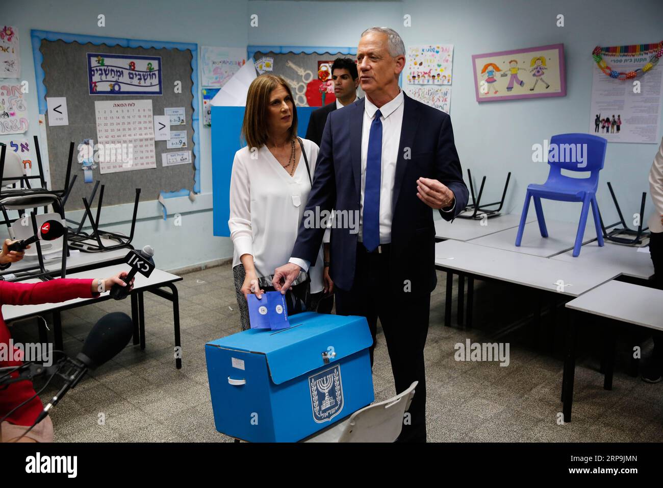 (190409) -- ROSH HAAYIN, April 9, 2019 -- Ex-army chief Benny Gantz (R), one of the leaders of the Blue and White party, and his wife Revital Gantz cast their votes in Rosh Haayin, near Tel Aviv, Israel, on April 9, 2019. Israel on Tuesday morning started day-long general elections across the country to choose its next parliament and decide the premiership. Gil Cohen Magen) ISRAEL-ROSH HAAYIN-ELECTION-VOTE-BENNY GANTZ guoyu PUBLICATIONxNOTxINxCHN Stock Photo