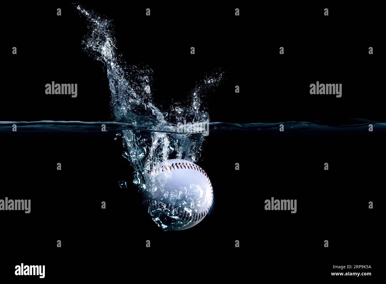 Baseball Splashing Water . Mixed media Stock Photo Alamy