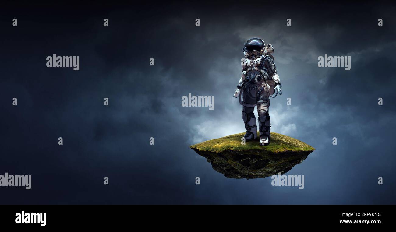 Astronaut walking on an unexplored planet Stock Photo - Alamy