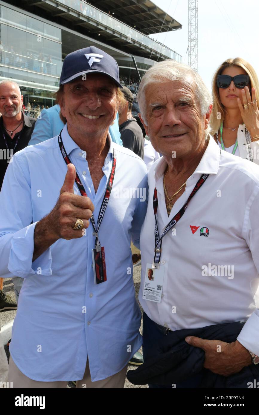 MONZA, Italy, 3. September 2023; Emerson Fittipaldi, Brazilian former automobile racing driver who won both the Formula One World Championship and the Indianapolis 500 twice with Giacomo Agostini is an Italian former Grand Prix motorcycle road racer. Nicknamed Ago, he amassed 122 Grand Prix wins and 15 World Championship titles.- Parco di Monza, Autodromo, Formula One, F1, Italian Grand Prix, Grosser Preis von Italien, GP d'Italie, Motorsport, Race, Formel1, Honorarpflichtiges Foto, Fee liable image, Copyright © Arthur THILL/ATP images (THILL Arthur/ATP/SPP) Stock Photo