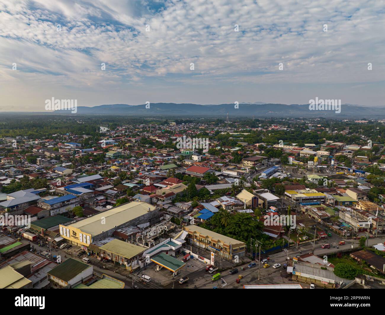 Residential buildings in Cotabato City. Skyline. Blue sky with clouds. Mindanao, Philippines. Stock Photo