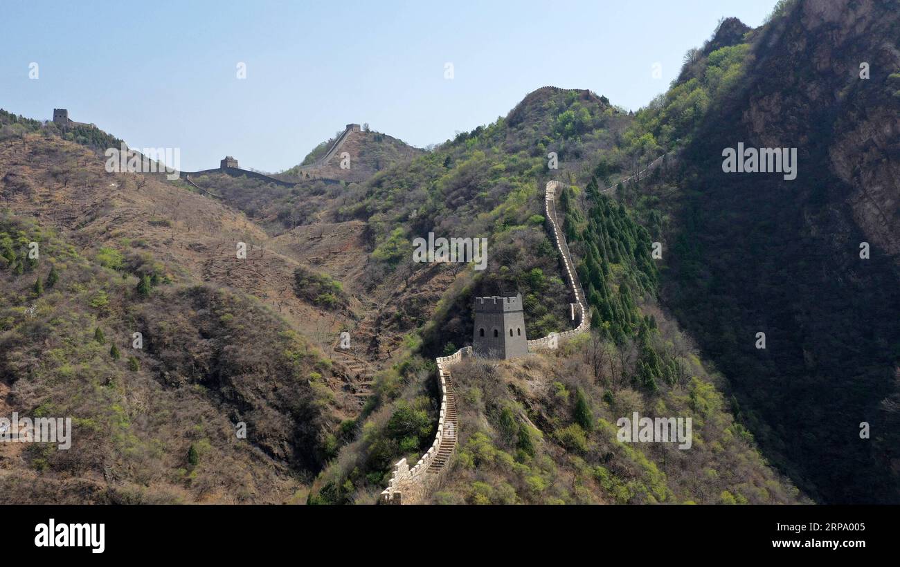 (190420) -- TIANJIN, April 20, 2019 (Xinhua) -- Aerial photo taken on April 19, 2019 shows the Huangyaguan Great Wall in the northern suburb of Tianjin, north China. The Huangyaguan Great Wall was built more than 14 centuries ago for border defense purpose. The structure winds its way for about 3,000 meters along the mountain areas of today s Jizhou District on the outskirts of Tianjin. (Xinhua/Li Ran) CHINA-TIANJIN-HUANGYAGUAN GREAT WALL (CN) PUBLICATIONxNOTxINxCHN Stock Photo