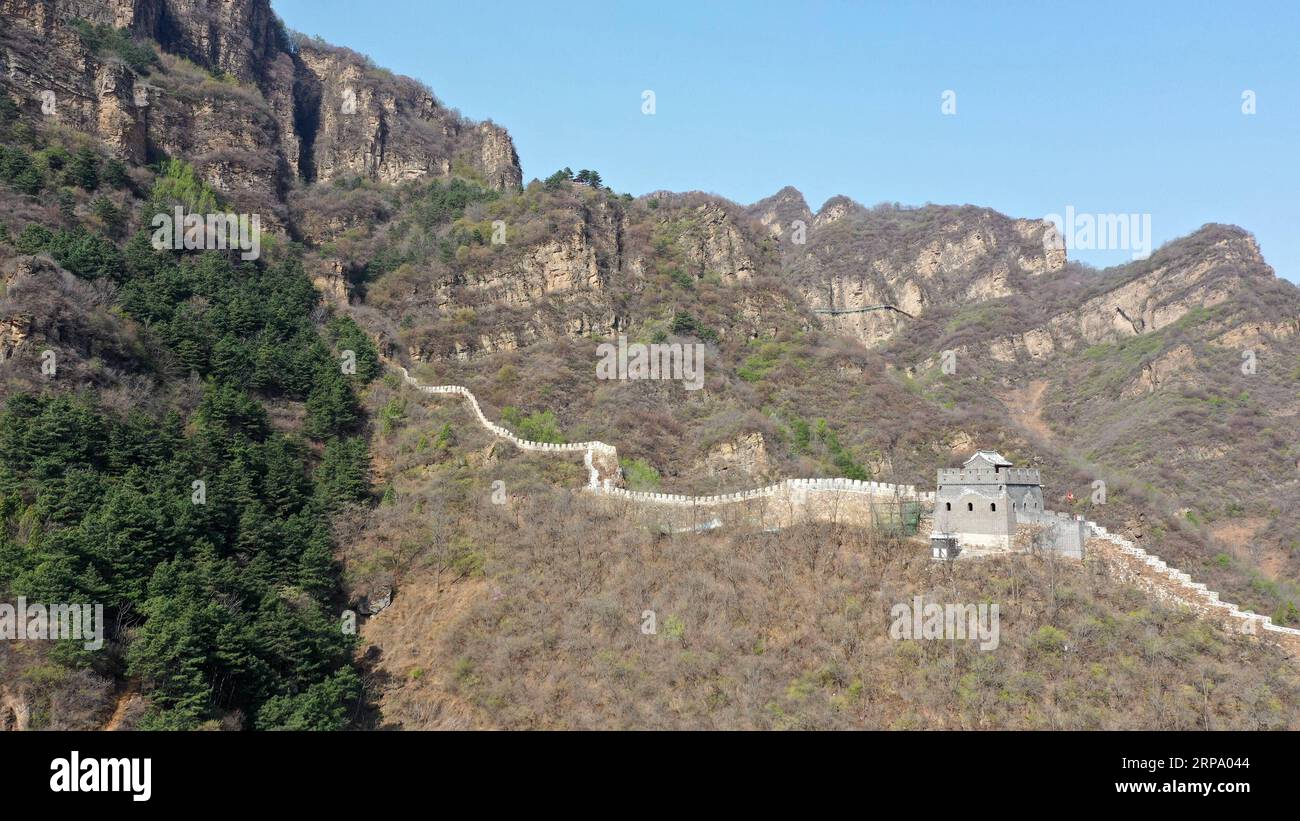 (190420) -- TIANJIN, April 20, 2019 (Xinhua) -- Aerial photo taken on April 19, 2019 shows the Huangyaguan Great Wall in the northern suburb of Tianjin, north China. The Huangyaguan Great Wall was built more than 14 centuries ago for border defense purpose. The structure winds its way for about 3,000 meters along the mountain areas of today s Jizhou District on the outskirts of Tianjin. (Xinhua/Li Ran) CHINA-TIANJIN-HUANGYAGUAN GREAT WALL (CN) PUBLICATIONxNOTxINxCHN Stock Photo