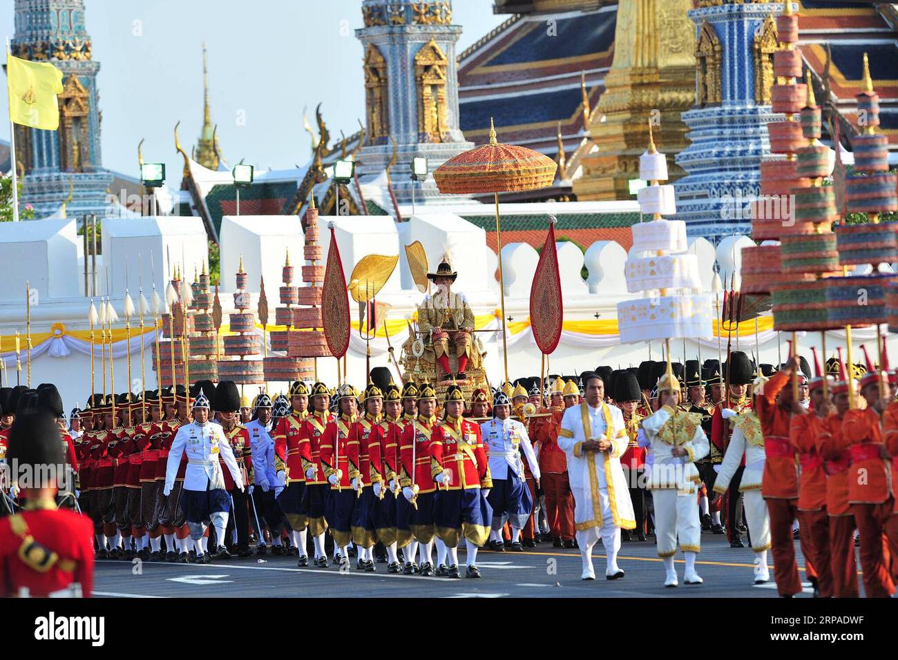 (190505) -- BANGKOK, May 5, 2019 -- Thailand s King Maha Vajiralongkorn is carried on a palanquin through the streets outside the Grand Palace for the public to pay homage during the second day of his coronation ceremony in Bangkok, Sunday, May 5, 2019. Thailand s His Majesty King Maha Vajiralongkorn on Sunday took a grandiose, magnificent procession to pay homage to former kings on a route lined with thousands of yellow-shirted people in Bangkok s olden quarters as part of the three-day coronation ceremonies. ) THAI-BANGKOK-MONARCH-PROCESSION RachenxSageamsak PUBLICATIONxNOTxINxCHN Stock Photo