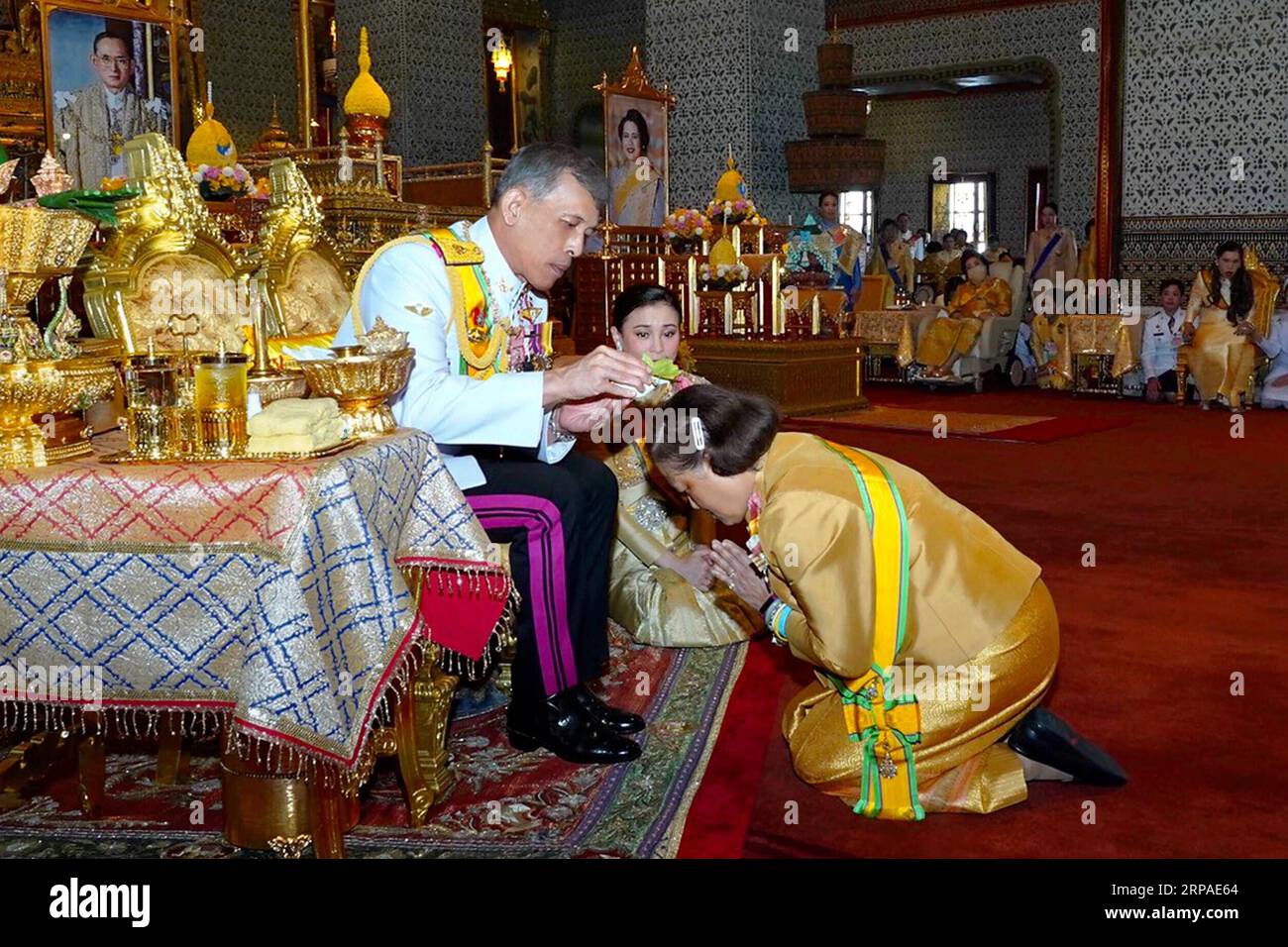 (190506) -- BANGKOK, May 6, 2019 -- Thai King Maha Vajiralongkorn pours sacred water on the head of Princess Maha Chakri Sirindhorn to grand new title and royal medals to her in Grand Palace, Bangkok, Thailand on May 5, 2019. Thailand s newly crowned King Maha Vajiralongkorn on Sunday granted new titles to the members of the royal family after he was crowned in the Baisal Daksin Throne Hall of the Grand Palace in Bangkok on Saturday. Bureau of the Royal Household) THAILAND-BANGKOK-ROYAL FAMILY-TITLES RachenxSageamsak PUBLICATIONxNOTxINxCHN Stock Photo