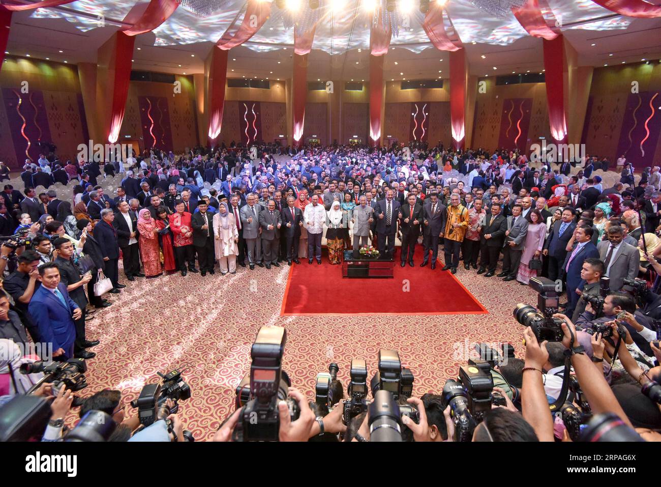 (190509) -- PUTRAJAYA, May 9, 2019 (Xinhua) -- Malaysian Prime Minister Mahathir Mohamad poses with his government ministers for photos at an event to mark the first year since his Pakatan Harapan (PH) coalition won power at the national polls on May 9 last year, in Putrajaya, Malaysia, May 9, 2019. Malaysia has achieved progress in combating corruption and in restoring government institutions after taking over the government in a smooth transition but much remains to be done especially in repairing the national economy, Malaysian Prime Minister Mahathir Mohamad said on Thursday. (Xinhua/Chong Stock Photo