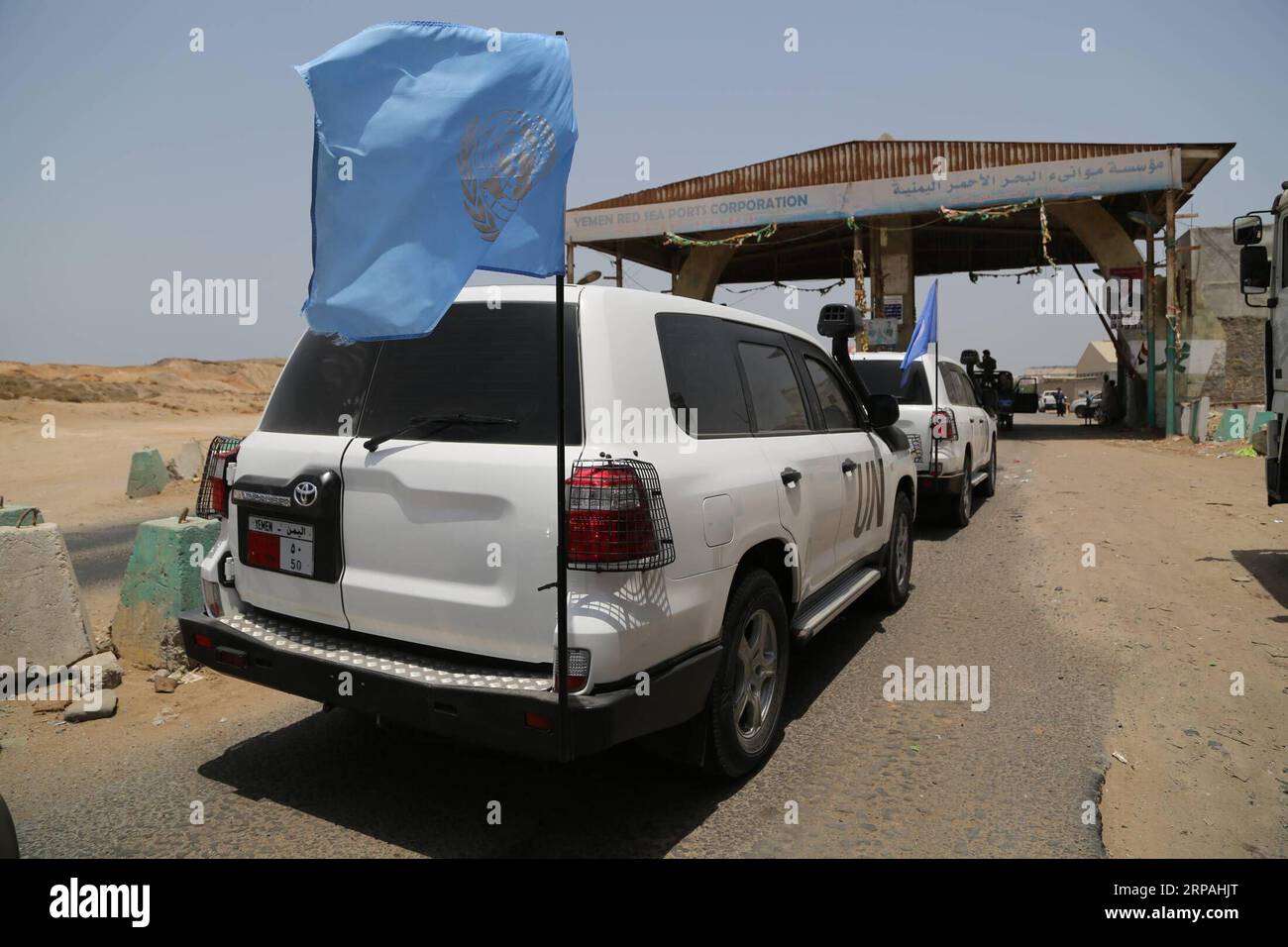 (190511) -- HODEIDAH (YEMEN), May 11, 2019 () -- UN vehicles arrive at the entrance of Salif port in Hodeidah, Yemen, on May 11, 2019. Yemen s Houthi rebels began on Saturday withdrawal from two ports of Hodeidah Province, eyewitnesses said. () YEMEN-HODEIDAH-PORTS-HOUTHI REBELS-WITHDRAWAL Xinhua PUBLICATIONxNOTxINxCHN Stock Photo