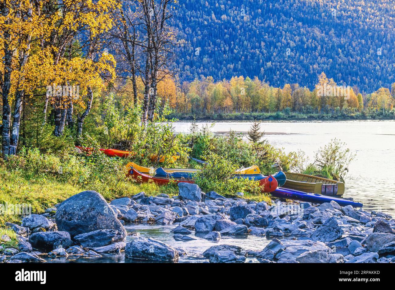 Lake colorful canoes hi-res stock photography and images - Alamy
