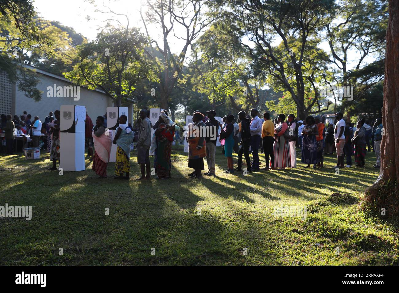 190521 -- BLANTYRE, May 21, 2019 Xinhua -- Voters wait to have their identities checked at Blantyre Secondary School Polling Station in Blantyre, Malawi, May 21, 2019. Malawians across the country on Tuesday queued up to cast ballots that will determine which party is to rule the country in the next five years. Xinhua/Peng Lijun MALAWI-BLANTYRE-ELECTION-VOTE PUBLICATIONxNOTxINxCHN Stock Photo