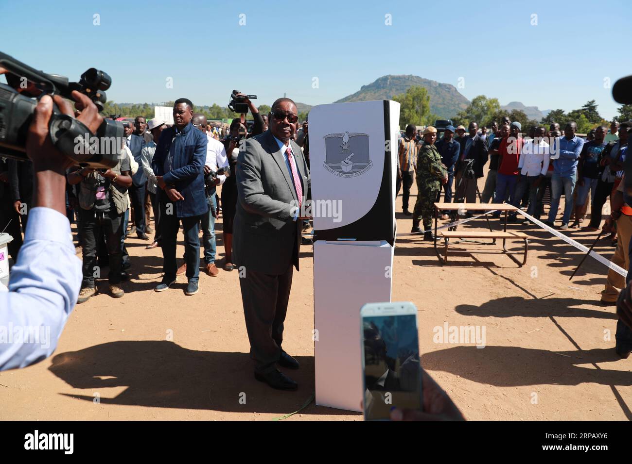 190521 -- THYOLO, May 21, 2019 Xinhua -- Malawian President Peter Mutharika prepares to cast his ballot at a polling station in Thyolo district, Malawi, May 21, 2019. Mutharika on Tuesday expressed happiness with the peaceful way the elections process has so far gone. Xinhua/Peng Lijun MALAWI-THYOLO-ELECTION-PRESIDENT-VOTE PUBLICATIONxNOTxINxCHN Stock Photo