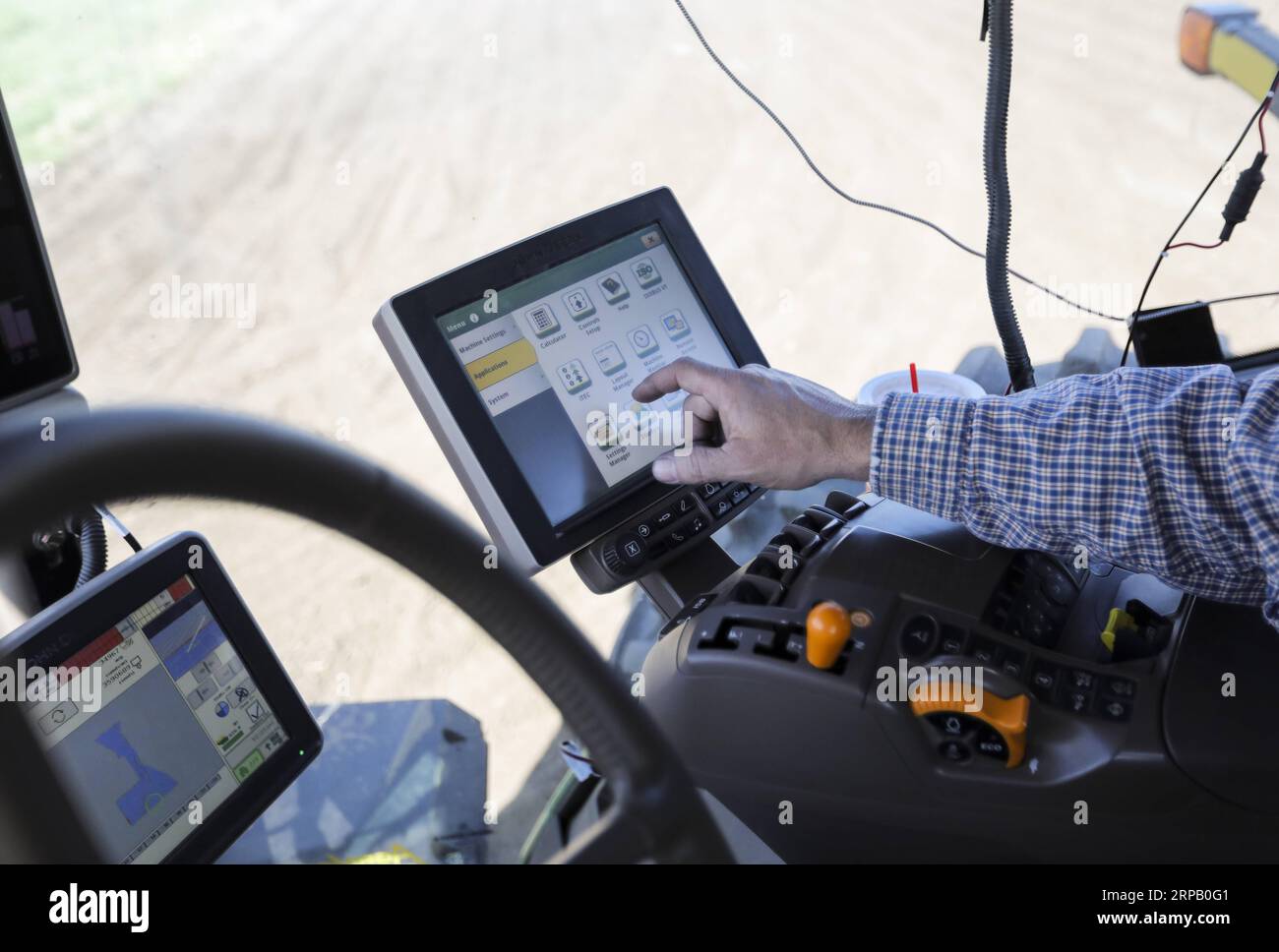 (190523) -- IOWA, May 23, 2019 (Xinhua) -- Bill Pellett s son Bret operates a planter machine at their family farm in Atlantic of Cass county, Iowa, the United States, April 24, 2019. Bill Pellett knows how to farm, but just like most of his peers across the country, the 71-year-old farmer is feeling less assured of what he could get from a new year of farming, as there appears to be no quick resolution of the year-long trade disputes between the United States and China. TO GO WITH Spotlight: Leading U.S. farming state enters new crop season amid uncertainty over trade prospects with China (Xi Stock Photo