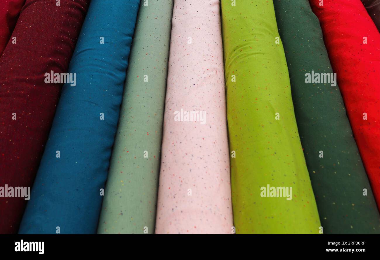 Close Up View On Samples Of Cloth And Fabrics In Different Colors Stock Photo