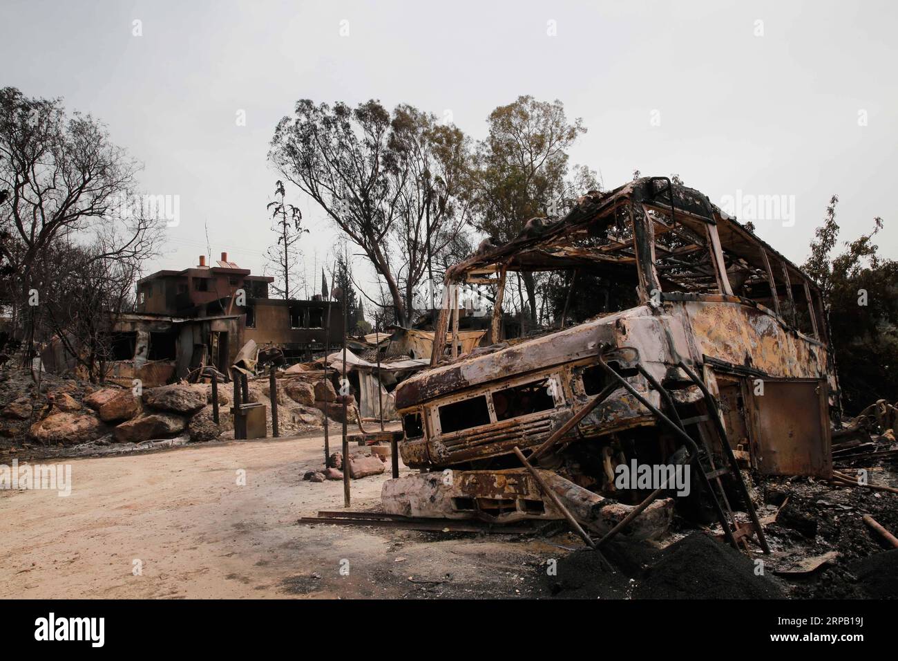 (190524) -- MEVO MODI IM, May 24, 2019 -- Photo taken on May 24, 2019 shows a burnt-down vehicle following a fire amidst extreme heat wave in the village of Mevo Modi im, Israel. The Israeli government said it is asking for international aid to fight dozens of huge fires that broke out on Thursday because of extreme hot weather of more than 40 degrees Celsius. ) ISRAEL-MEVO MODI IM-FIRE-DAMAGE GilxCohenxMagen PUBLICATIONxNOTxINxCHN Stock Photo