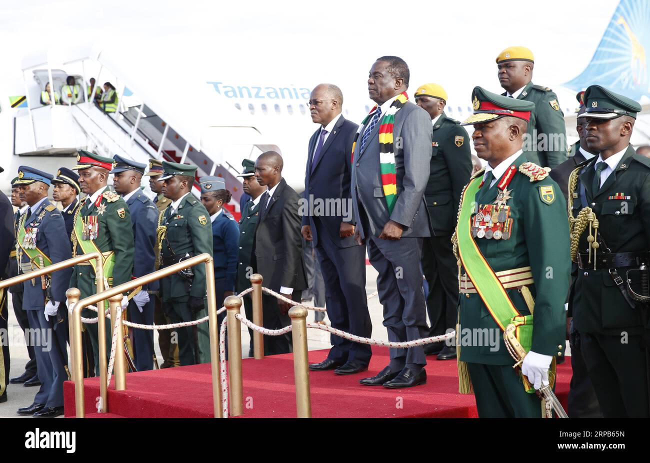 (190528) -- HARARE, May 28, 2019 -- Zimbabwean President Emmerson Mnangagwa (R, Front, on stage) welcomes Tanzanian President John Magufuli (L, Front, on stage) at the Robert Gabriel Mugabe International Airport in Harare, Zimbabwe, on May 28, 2019. Visiting Tanzanian President John Magufuli arrived in Zimbabwe on Tuesday for a two-day official visit. ) ZIMBABWE-HARARE-TANZANIA-PRESIDENT-VISIT ShaunxJusa PUBLICATIONxNOTxINxCHN Stock Photo