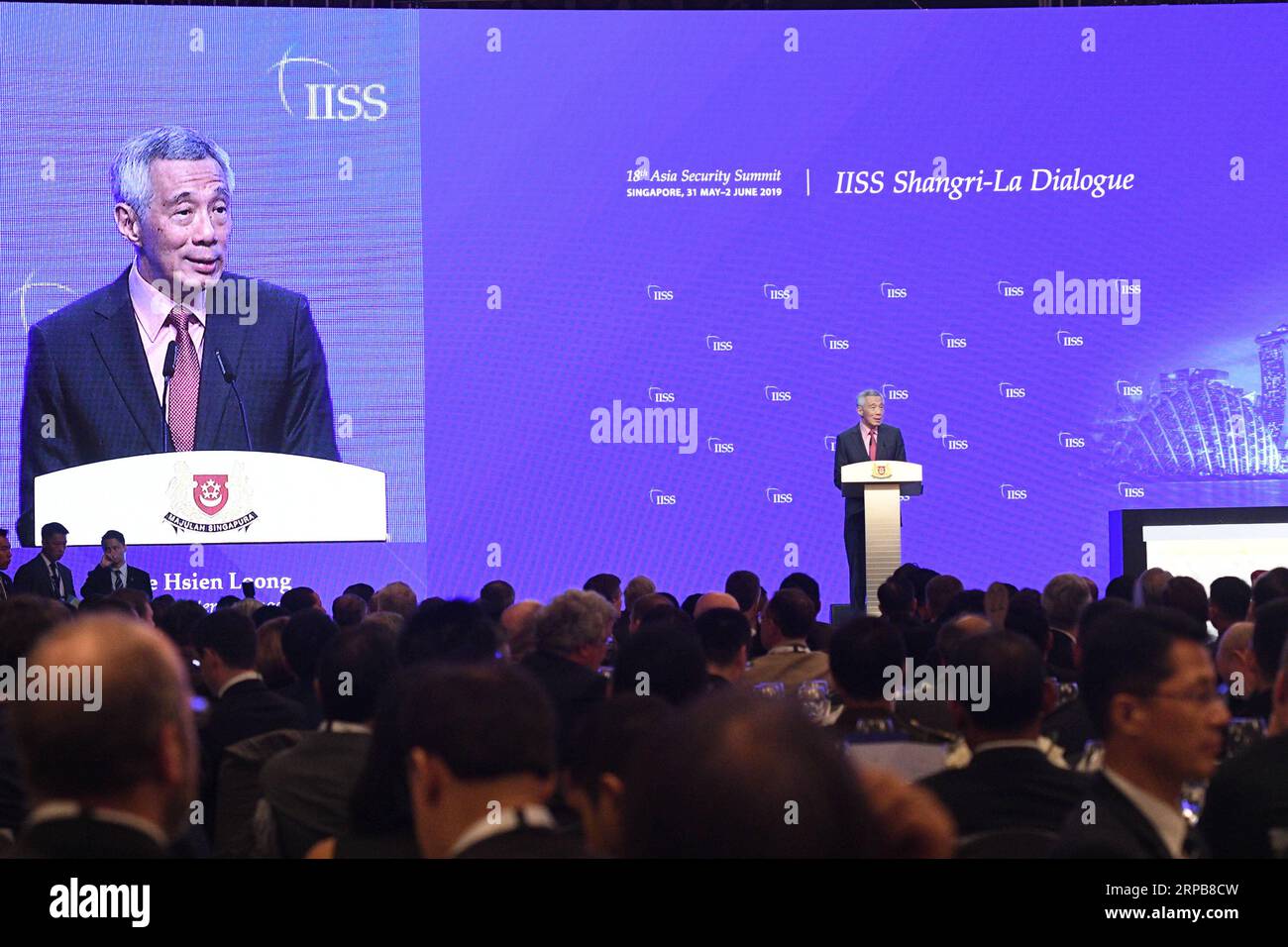 (190531) -- SINGAPORE, May 31, 2019 -- Singaporean Prime Minister Lee Hsien Loong delivers a keynote speech at the 18th Shangri-La Dialogue held in Singapore, May 31, 2019. The 18th Shangri-La Dialogue opened here Friday evening to discuss the security situation and its challenges in the Asia-Pacific. In a keynote speech to open the event, Singaporean Prime Minister Lee Hsien Loong called for building a broader regional cooperation and multi-lateral arrangements, reaffirming Singapore s support to the China-proposed Belt and Road Initiative. Then Chih Wey) SINGAPORE-PM-SHANGRI-LA DIALOGUE-KEYN Stock Photo
