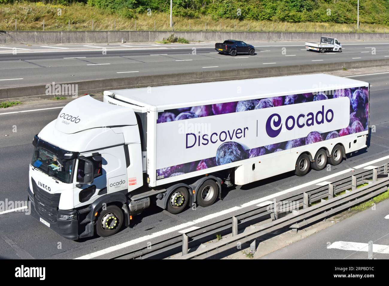 Aerial view white hgv lorry truck power unit aerodynamic deflector above cab Discover Ocado
