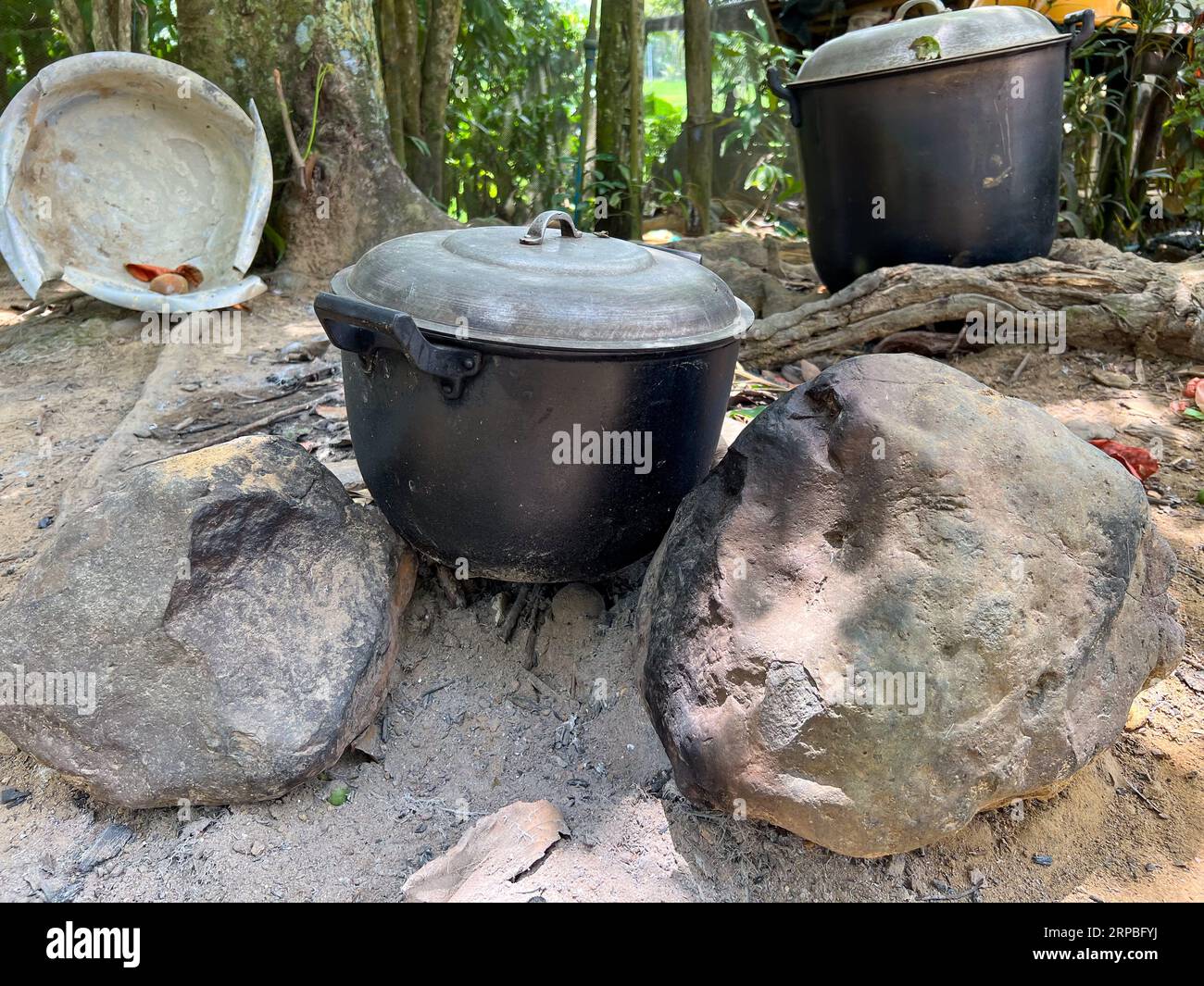 Traditional primitive Philippine style ground cooking using rocks and