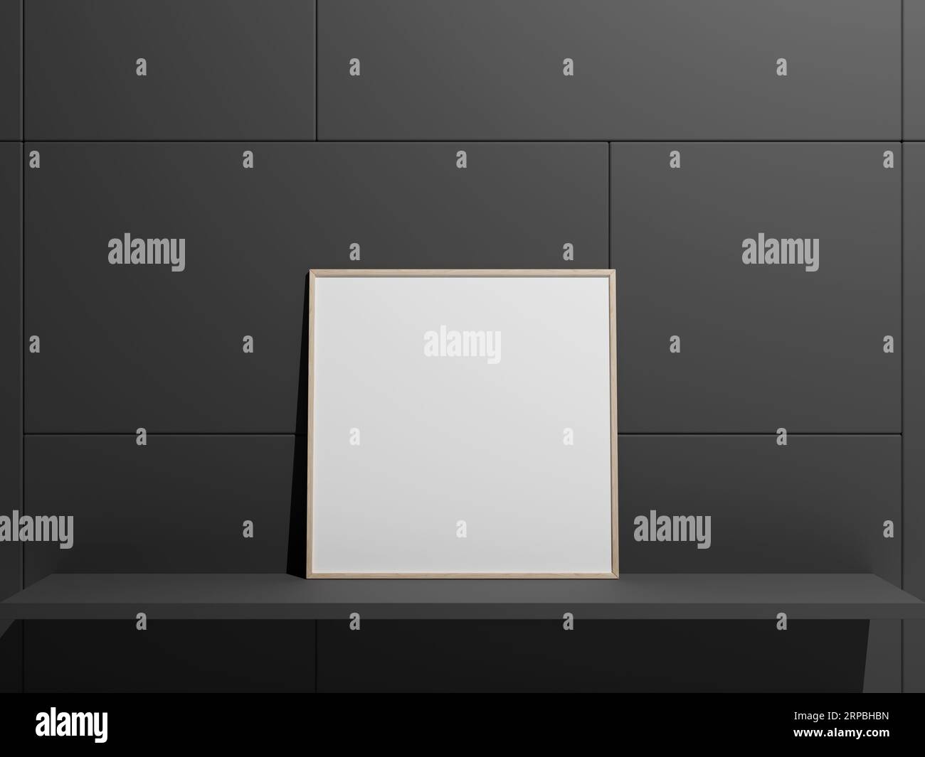 Hanging empty blank frame leaning against the wall Stock Photo