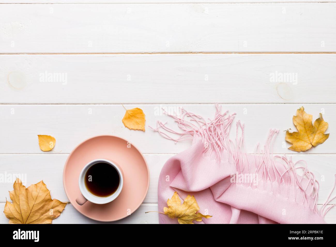 Flat lay composition with colorful Autumn cup of coffee and leaves on a ...