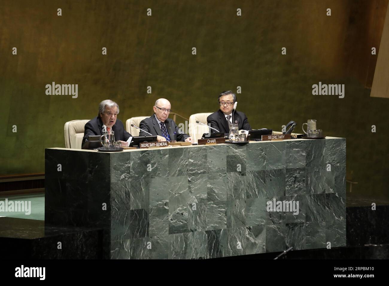(190611) -- UNITED NATIONS, June 11, 2019 -- UN Secretary-General Antonio Guterres (L) addresses the 12th Session of the Conference of States Parties to the Convention on the Rights of Persons with Disabilities at the UN headquarters in New York, on June 11, 2019. The acting chair of Committee on the Rights of Persons with Disabilities said on Tuesday that due to cash flow difficulties United Nations is facing, sessions of six of the ten UN human rights treaty bodies will be cancelled. ) UN-CONFERENCE-RIGHTS OF PERSONS WITH DISABILITIES LixMuzi PUBLICATIONxNOTxINxCHN Stock Photo