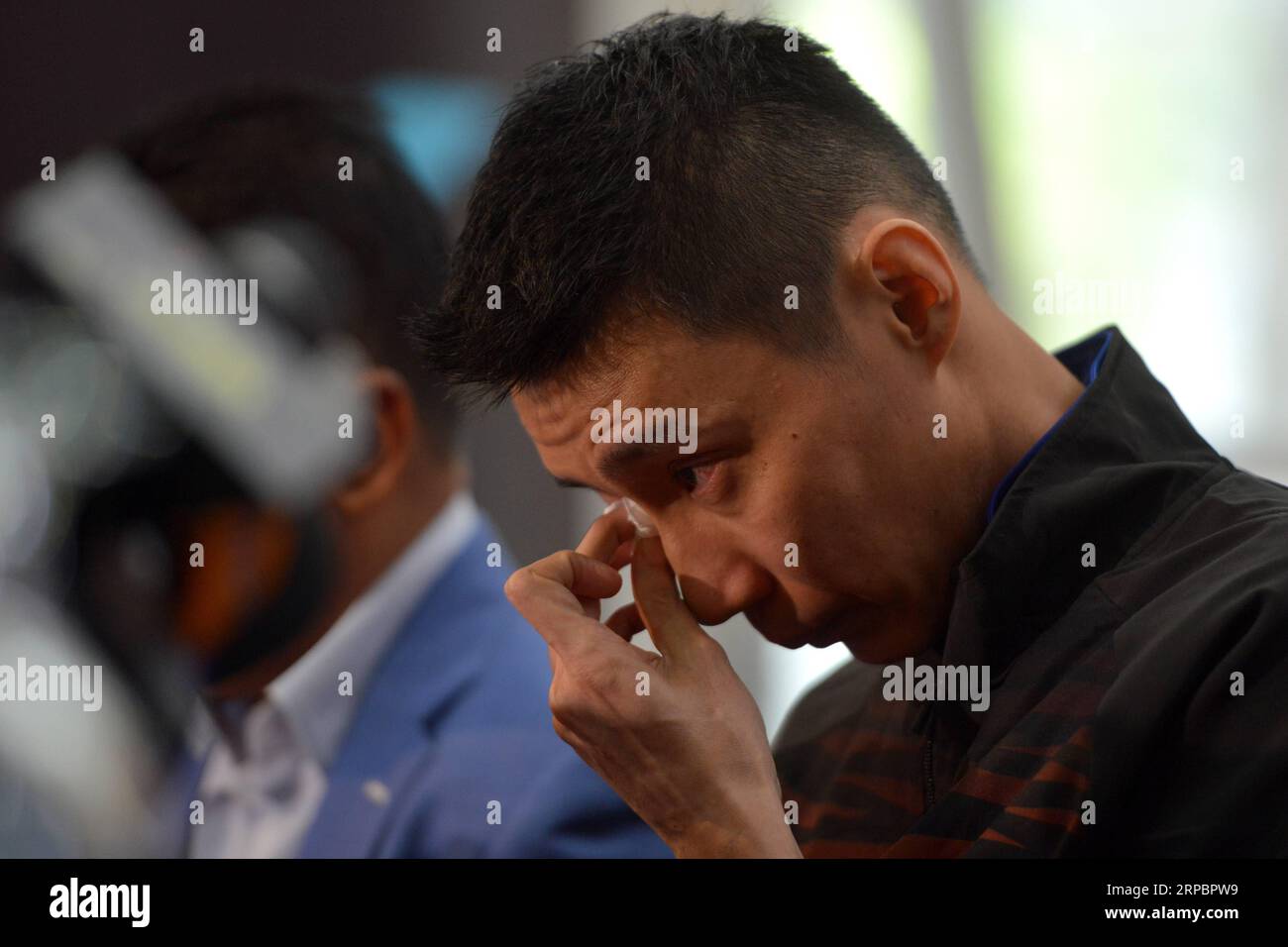 (190614) -- BEIJING, June 14, 2019 -- Malaysia s badminton player Lee Chong Wei reacts during a news conference to announce his retirement in Putrajaya, Malaysia, June 13, 2019. ) XINHUA PHOTOS OF THE DAY ChongxVoonxChung PUBLICATIONxNOTxINxCHN Stock Photo