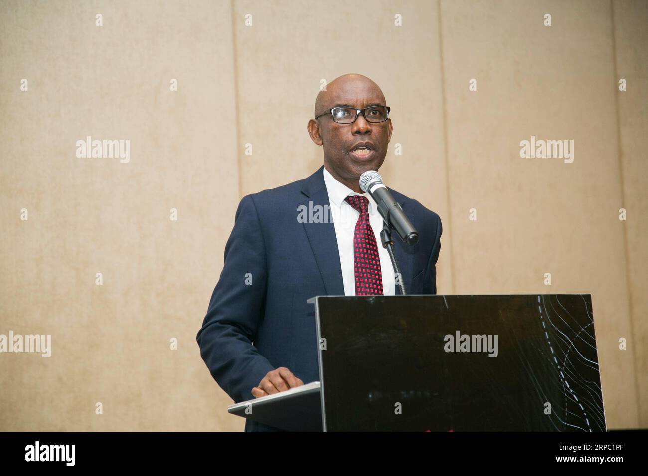 (190621) -- KIGALI, June 21, 2019 -- Veteran Rwandan journalist Gerald Mbanda speaks at the launch of his book China and Rwanda: Effective Leadership is Key to Transformational Governance in Kigali, Rwanda, June 20, 2019. Mbanda, head of media affairs and communication department of Rwanda Governance Board, noted at the launch that the experiences of Rwanda and China demonstrate that all countries are capable of developing their own growth models without cloning the Western ones. ) RWANDA-KIGALI-CHINA-BOOK CyrilxNdegeya PUBLICATIONxNOTxINxCHN Stock Photo
