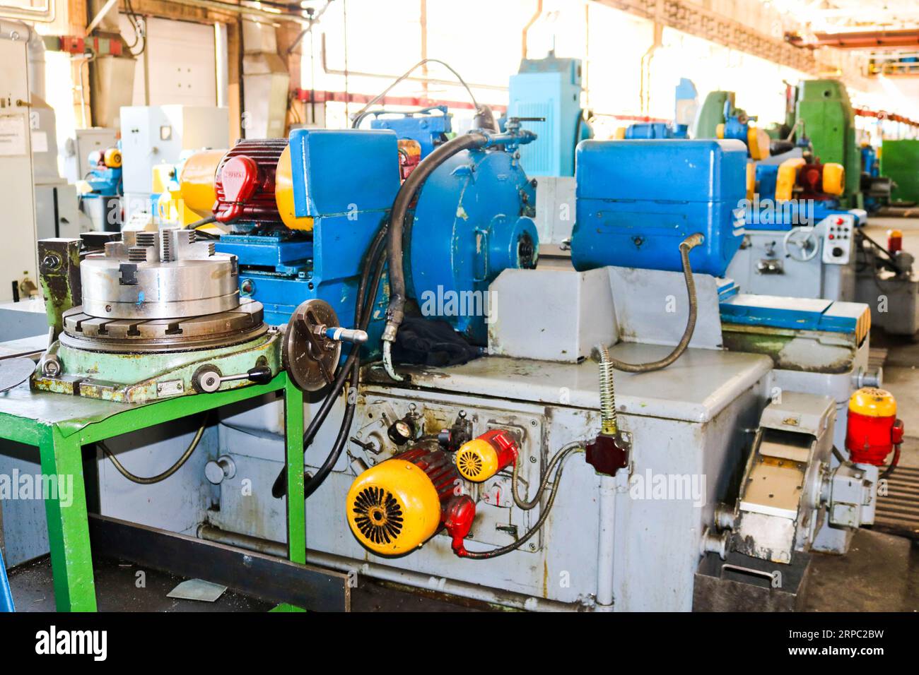 Industrial iron lathe for cutting, turning of billets from metals, wood