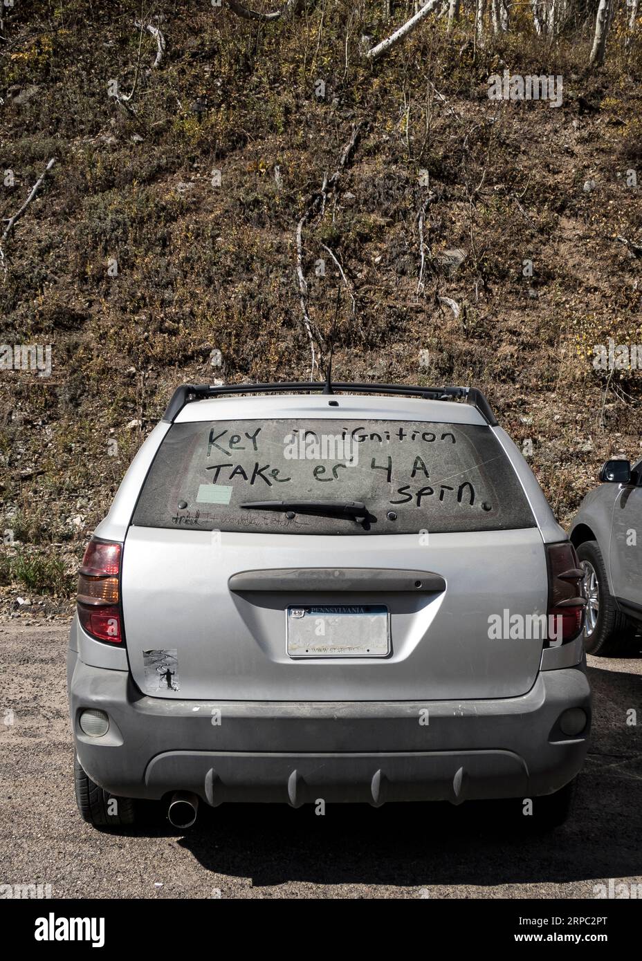 Key in ignition TAKe er' 4 A spin Stock Photo Alamy