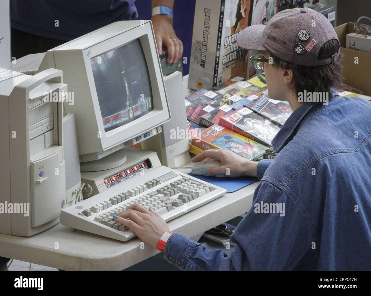 (190622) -- VANCOUVER, June 22, 2019 -- A visitor tries a computer game at the Vancouver Retro Gaming Expo in New Westminster, Canada, June 22, 2019. The Vancouver Retro Gaming Expo was held at the Anvil Centre on Saturday, offering different collections of video games, consoles and collectibles from 1970s to 1990s. ) CANADA-NEW WESTMINSTER-RETRO GAMING EXPO LiangxSen PUBLICATIONxNOTxINxCHN Stock Photo