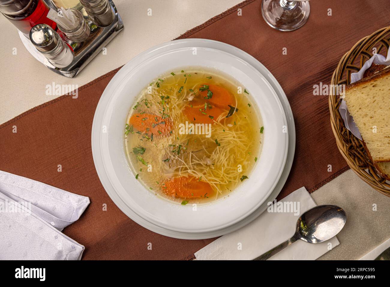 Top view of chicken noodle soup with carrots Stock Photo