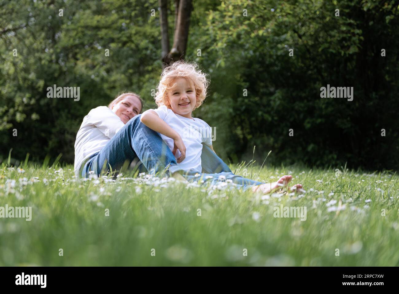 Mom and son spend time together in the park. Stock Photo
