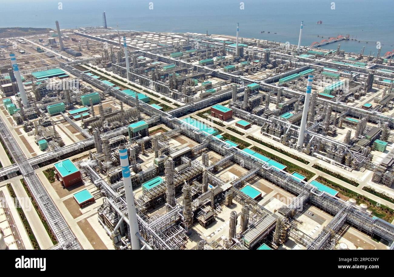 (190701) -- DALIAN, July 1, 2019 -- Aerial photo taken on May 17, 2019 shows the Hengli Petrochemical (Changxing Island) Industrial Park in Dalian, northeast China s Liaoning Province. The 2019 Summer Davos Forum is held from July 1-3 in northeast China s coastal city of Dalian. Established by the World Economic Forum in 2007, the forum is held annually in China, alternating between the two port cities of Dalian and Tianjin. Summer Davos has been reshaping the landscape of Dalian s regional economy and strengthening the port s trade with other markets. Dalian has become an international city a Stock Photo