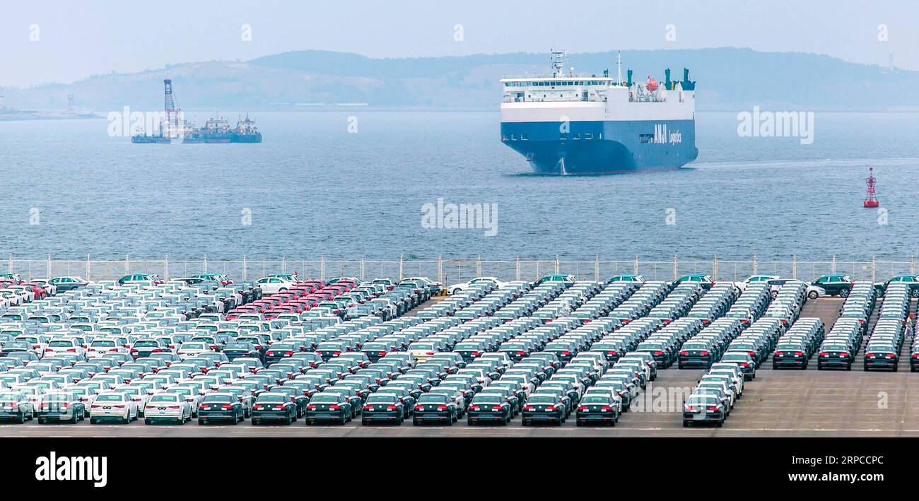 190701 -- DALIAN, July 1, 2019 -- Photo taken on June 28, 2019 shows the vehicle terminal of Dalian Port in Dalian, northeast China s Liaoning Province. The 2019 Summer Davos Forum is held from July 1-3 in northeast China s coastal city of Dalian. Established by the World Economic Forum in 2007, the forum is held annually in China, alternating between the two port cities of Dalian and Tianjin. Summer Davos has been reshaping the landscape of Dalian s regional economy and strengthening the port s trade with other markets. Dalian has become an international city and a showpiece of China s reform Stock Photo