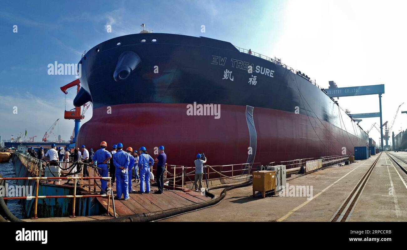 (190701) -- DALIAN, July 1, 2019 -- A cargo ship is seen at Dalian Shipbuilding Industry Co., Ltd. in Dalian, northeast China s Liaoning Province, June 25, 2019. The 2019 Summer Davos Forum is held from July 1-3 in northeast China s coastal city of Dalian. Established by the World Economic Forum in 2007, the forum is held annually in China, alternating between the two port cities of Dalian and Tianjin. Summer Davos helped Dalian reshape the landscape of regional economy and strengthen the port s trade with other markets. Dalian has become an international city and a showpiece of China s reform Stock Photo
