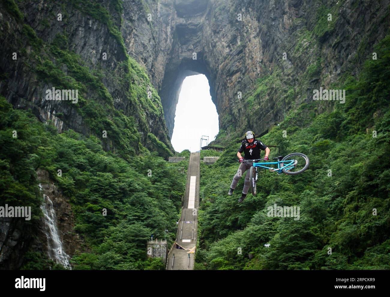 (190708) -- BEIJING, July 8, 2019 -- Nicholi Rogatkin from the United States competes during the 2nd Red Bull Sky Gate race held in Zhangjiajie, central China s Hunan Province, July 16, 2016. Located in central China, Hunan Province is well-known for its varied topography. It abuts the Dongting Lake to the north, and the east, south and west sides of the province are surrounded by mountains, with Wuling and Xuefeng Mountains to the west, Nanling Mountain to the south, Luoxiao and Mufu Mountains to the east. The Xiangjiang, Zijiang, Yuanjiang and Lishui Rivers converge on the Yangtze River at t Stock Photo