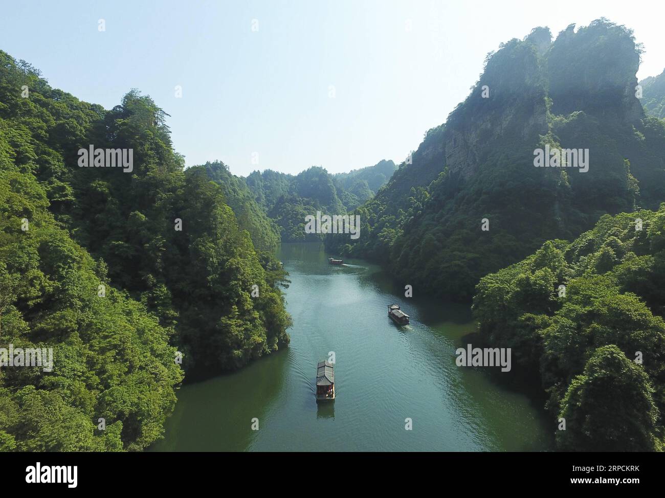 (190708) -- BEIJING, July 8, 2019 -- Aerial photo taken on June 1, 2019 shows a view of the Baofeng Lake in the Wulingyuan Scenic Area in Zhangjiajie, central China s Hunan Province. Located in central China, Hunan Province is well-known for its varied topography. It abuts the Dongting Lake to the north, and the east, south and west sides of the province are surrounded by mountains, with Wuling and Xuefeng Mountains to the west, Nanling Mountain to the south, Luoxiao and Mufu Mountains to the east. The Xiangjiang, Zijiang, Yuanjiang and Lishui Rivers converge on the Yangtze River at the Dongti Stock Photo