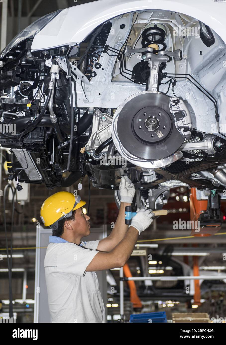 (190709) -- CHANGCHUN, July 9, 2019 -- A worker assembles an Audi vehicle at FAW-Volkswagen factory in Changchun, northeast China s Jilin Province, July 9, 2019. The Sino-German auto joint venture FAW-Volkswagen said a record 311,871 Audi vehicles were sold in China in the first half of 2019, up 2.1 percent year-on-year. ) CHINA-JILIN-CHANGCHUN-AUDI-SALES RECORD XuxChang PUBLICATIONxNOTxINxCHN Stock Photo