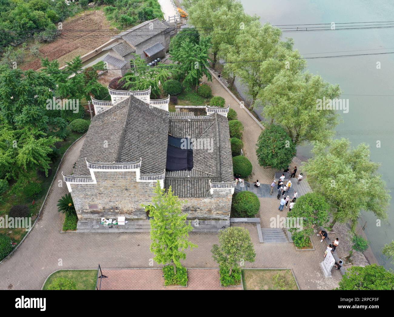 (190710) -- XING AN, July 10, 2019 -- Aerial photo taken on June 29, 2019 shows the Sanguantang building complex which once served as the Red Army s command headquarters during the 1934 Battle of Xiangjiang in Jieshou Town of Xing an County, south China s Guangxi Zhuang Autonomous Region. Memorial halls and martyrs cemeteries are springing up in many revolutionary places over the past few years, especially those along the Long March route. Visitors from all over China come to these memorials, reconnecting with history, reclaiming the Long March spirit and adding more momentum to the red touris Stock Photo