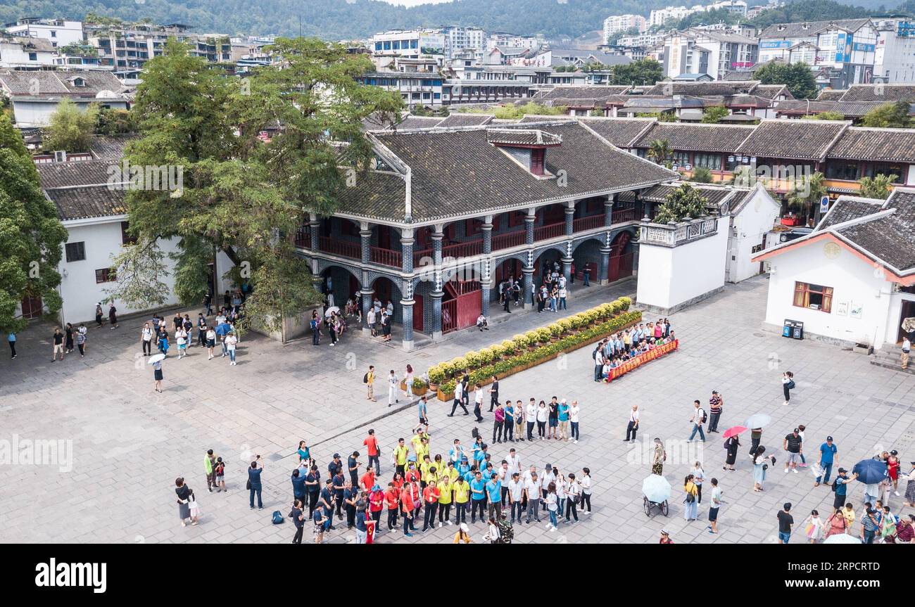 (190712) -- ZUNYI, July 12, 2019 -- Aerial photo taken on July 4, 2019 shows people visiting the site of the Zunyi Conference in Zunyi City, southwest China s Guizhou Province. The 1935 Zunyi Conference, during which late Chinese leader Mao Zedong established his authority within the military, is a key conference during the Long March. The Long March is a military maneuver carried out from 1934 to 1936. During this period, the Chinese Workers and Peasants Red Army made their way from Ganzhou to Yan an by way of Zunyi, breaking the siege of the Kuomintang forces to continue their resistance aga Stock Photo