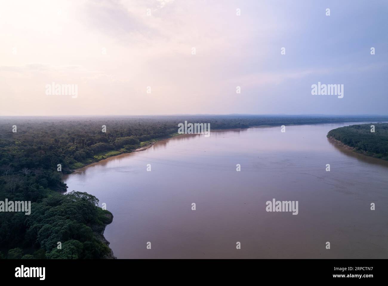 Beautiful Amazon rainforest landscape drone aerial view of Madeira river in the border of Brazil and Bolivia in sunny summer afternoon. Environment Stock Photo
